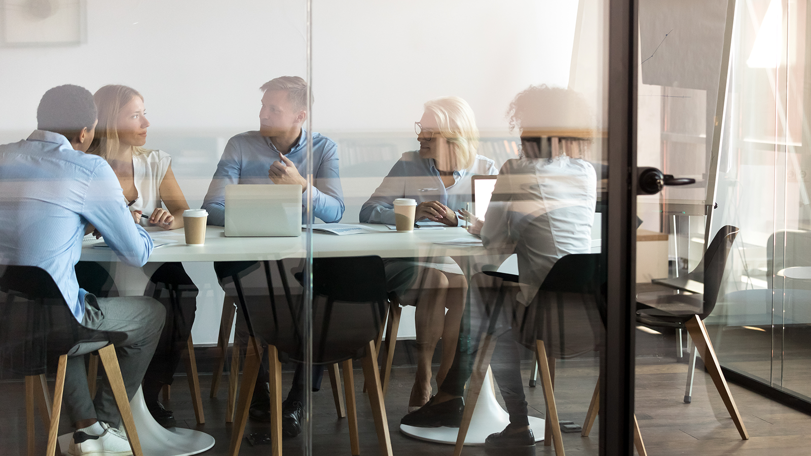 Group of business people are discussiong together