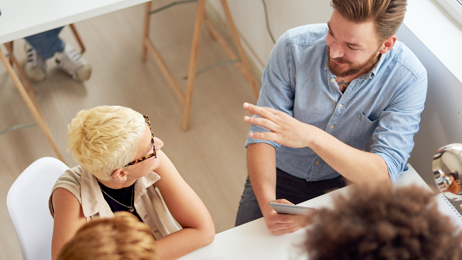 Group of business people are discussing together