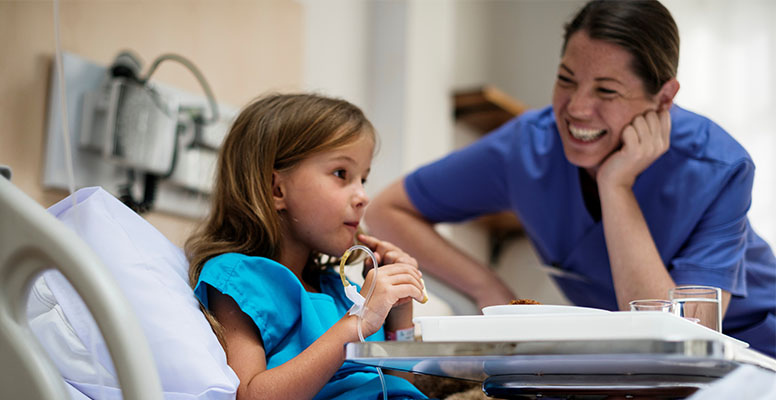 Nurse taking care of a baby girl