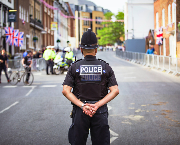 Policeman standing on the street