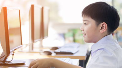 Boy working on a computer