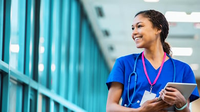 Smiling female healthcare professional at work