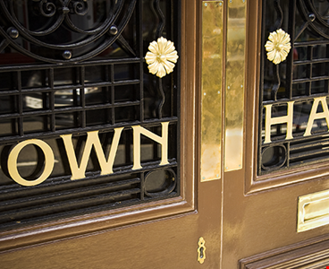 Golden town hall sign