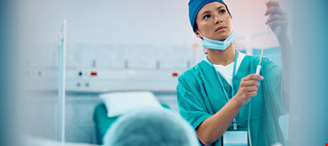 Mid adult nurse taking care patient