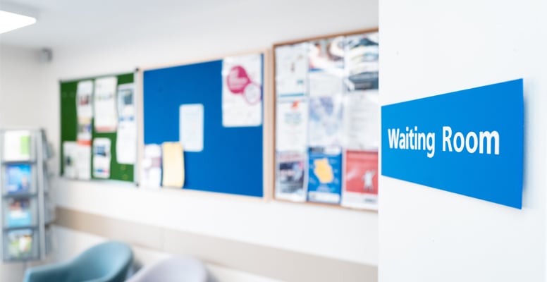 NHS hospital waiting room sign 
