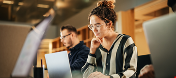 portrait-enthusiastic-hispanic-young-woman-working