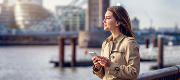 portrait-trendy-business-woman-holding-mobile