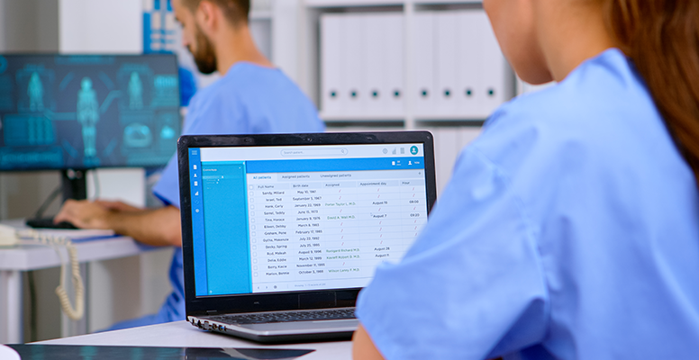 Professional doctor assistant checking medical records
