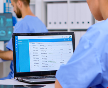 Professional doctor assistant checking medical records