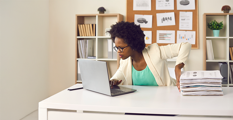 Secretary or financial accountant organizing digital documents on computer