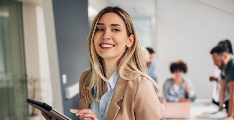 Smiling confident business leader