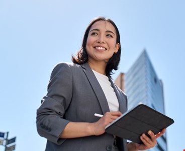 Smiling young Asian business woman leader entrepreneur