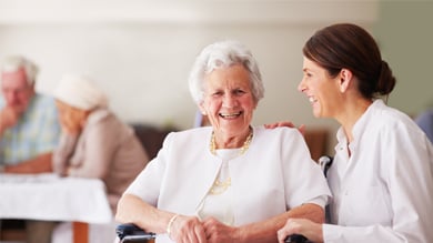 Young woman taking care of old lady