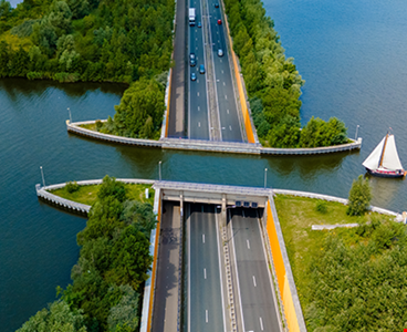 A road stretches across a canal
