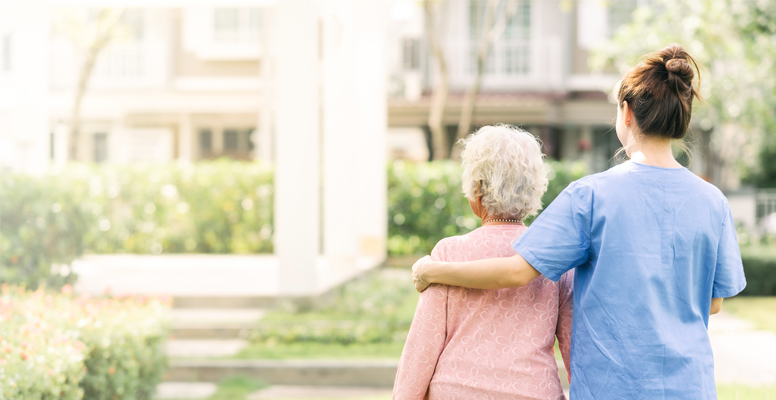 Healthcare worker with senior woman
