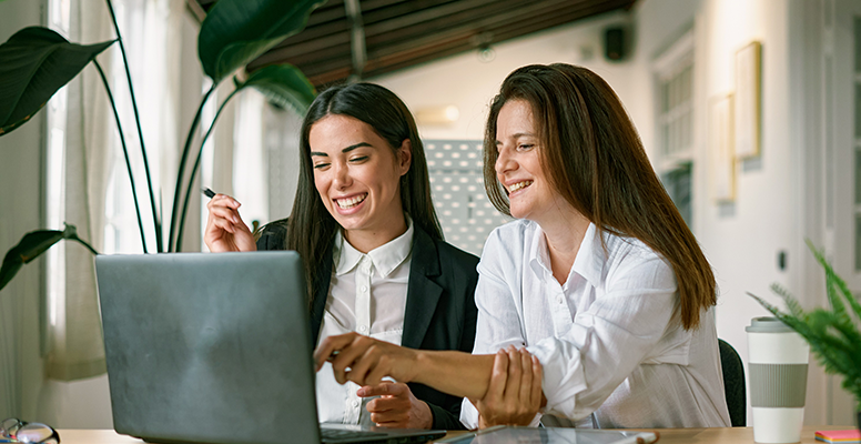 Female employees working on project together